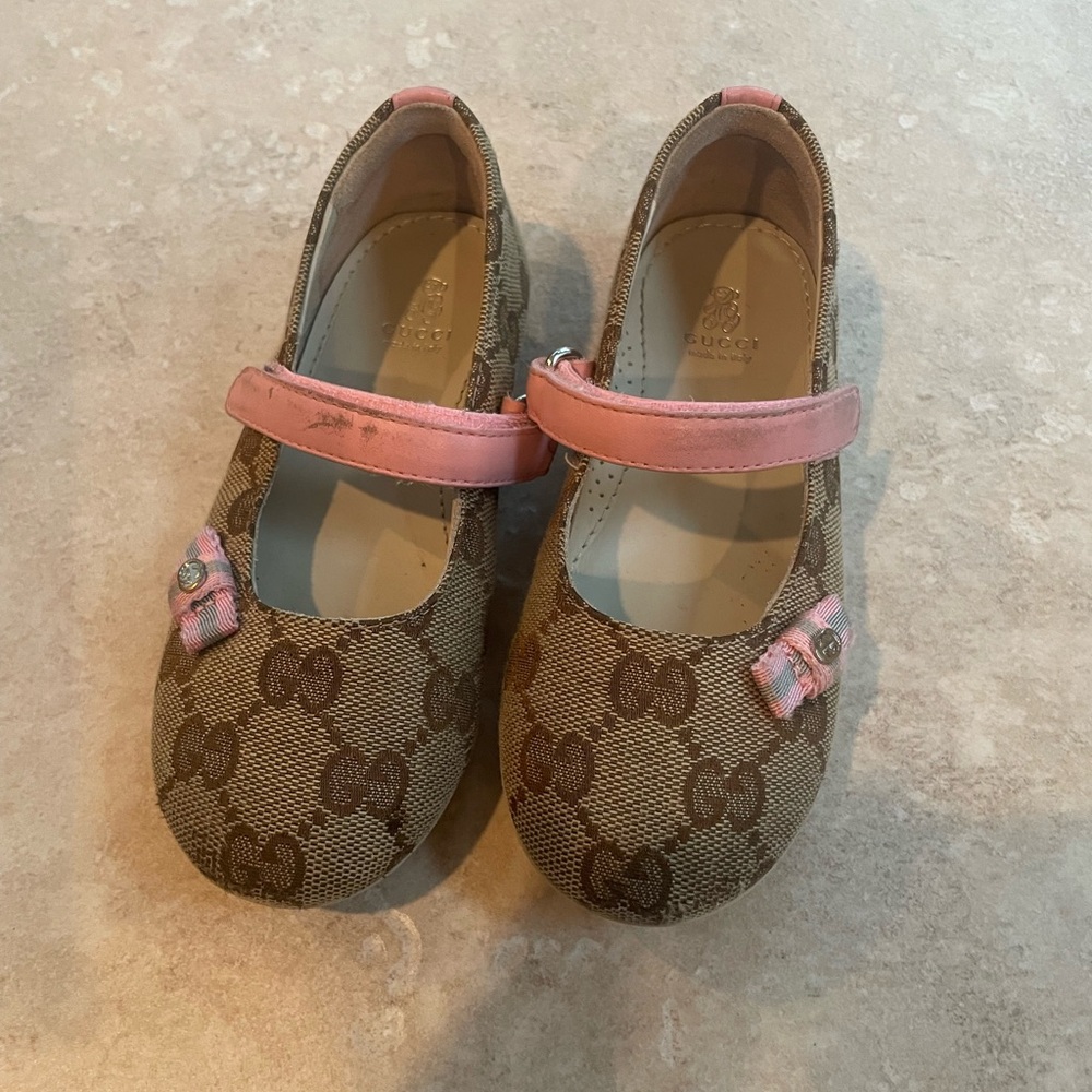 Little girls Gucci ballerina shoes.